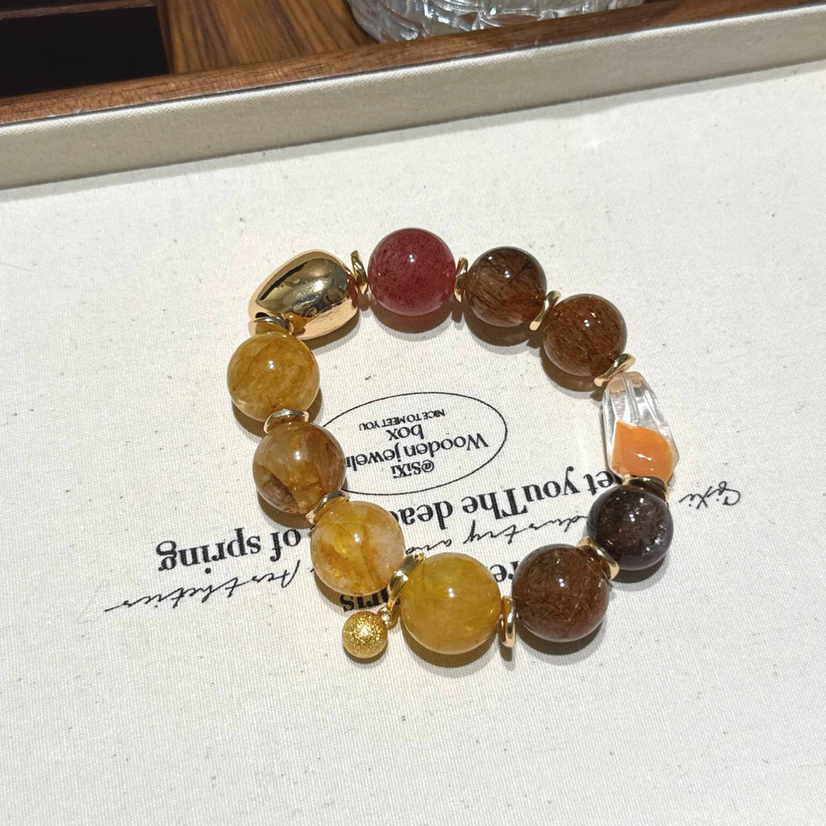 胶花黑金超草莓晶手串