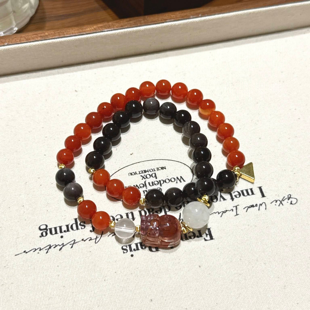 南红玛瑙银曜石貔貅手串